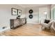 Stylish living room featuring hardwood floors, modern decor, and lots of natural light at 1615 Osceola St, Denver, CO 80204