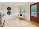 Cozy living room with hardwood floors, ample natural light, and modern decor at 1615 Osceola St, Denver, CO 80204
