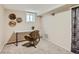 Dedicated office space with a stylish chair, modern desk, and neutral decor at 1615 Osceola St, Denver, CO 80204
