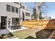 Modern home showcasing a fenced backyard with a patio, perfect for outdoor entertaining and relaxation at 1688 S Grant St, Denver, CO 80210