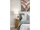 Bedroom with modern design with artwork, end table and lamp at 1688 S Grant St, Denver, CO 80210