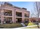 Attractive three-story brick building with balconies, offering a welcoming facade at 1688 S Grant St, Denver, CO 80210