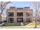 Beautiful three-story brick building with balconies and well-maintained landscaping at 1688 S Grant St, Denver, CO 80210
