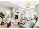 Bright and airy living room with fireplace, comfortable seating, and modern decor at 1688 S Grant St, Denver, CO 80210