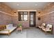 Cozy patio with comfortable seating, decorative accents, and charming brick walls at 1688 S Grant St, Denver, CO 80210