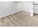 Large basement with neutral carpet, white walls, and closet space at 3932 S Quatar St, Aurora, CO 80018