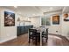 Finished basement area with a kitchenette, dining area, and ample space for entertaining or relaxing at 1113 Southbury Pl, Highlands Ranch, CO 80129