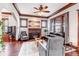 Comfortable living room with hardwood floors, original woodwork, fireplace and stylish furnishings at 1399 Newton St, Denver, CO 80204