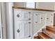 Vintage cabinets adorn the stairway of this well-maintained home at 1399 Newton St, Denver, CO 80204
