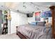 Bedroom with a guitar, decorations, closet and TV at 1885 S Quebec Way # G 106, Denver, CO 80231