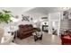 Inviting living room featuring a plush sofa, modern decor, and updated flooring at 1885 S Quebec Way # G 106, Denver, CO 80231