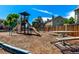 Well-maintained community playground with swings, climbing structures, and a picnic table for Gathering gatherings at 1885 S Quebec Way # G 106, Denver, CO 80231