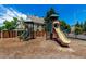 Bright, fun, and secure community playground with various slides, climbing structures, and play areas at 1885 S Quebec Way # G 106, Denver, CO 80231