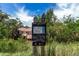 Trail sign in natural surroundings at 1885 S Quebec Way # G 106, Denver, CO 80231