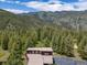 Panoramic aerial view of the home with mountain backdrop at 173 Silver Cloud Ln, Boulder, CO 80302