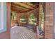 Outdoor brick balcony space offers lovely wooded views at 173 Silver Cloud Ln, Boulder, CO 80302
