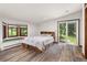 Bedroom with built-in bay window seating and outdoor access at 173 Silver Cloud Ln, Boulder, CO 80302