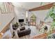 Open living room with vaulted ceilings, wood beam, fireplace, and dining area at 173 Silver Cloud Ln, Boulder, CO 80302