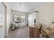 This home office features a built-in Murphy bed and a well-lit workspace, perfect for productivity and relaxation at 8435 Pebble Creek Way # 104, Highlands Ranch, CO 80126