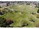 Sprawling community park with walking paths, mature trees, and a soccer field at 4250 S Olive St # 102, Denver, CO 80237