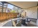 Cozy covered patio with comfortable seating, perfect for outdoor relaxation and entertaining at 4250 S Olive St # 102, Denver, CO 80237