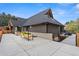 Backyard with a patio, planter boxes, modern railing, and a view of the house at 5859 E Ida Pl, Greenwood Village, CO 80111
