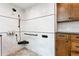 Modern bathroom shower with stone floors, grab bar, and built-in shelving for a spa-like experience at 5859 E Ida Pl, Greenwood Village, CO 80111