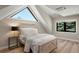 Charming bedroom features unique window and a comfortable bed, creating a cozy and inviting space at 5859 E Ida Pl, Greenwood Village, CO 80111