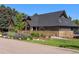 Beautiful home exterior featuring a modern design, manicured garden, and a charming fence for added privacy at 5859 E Ida Pl, Greenwood Village, CO 80111