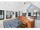 Spacious living room features vaulted ceiling, modern lighting, and a comfortable leather sectional sofa at 5859 E Ida Pl, Greenwood Village, CO 80111
