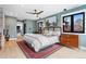 Inviting main bedroom with wood floors, stylish furnishings, and ample natural light at 5859 E Ida Pl, Greenwood Village, CO 80111