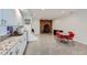 Finished basement offers retro-style kitchen cabinets, dining area and brick fireplace feature at 8229 Red Rock Pl, Larkspur, CO 80118