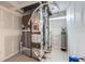 Utility room with water heater, furnace, and other HVAC-related equipment at 8229 Red Rock Pl, Larkspur, CO 80118