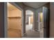 Hallway with access to the bedroom, ensuite bathroom, and walk-in closet at 1430 Bluefield Ave, Longmont, CO 80504
