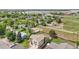 Spacious home with a fenced yard, mature trees, and a detached garage sits in an established neighborhood at 1973 Bahama St, Aurora, CO 80011