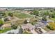 Aerial view of the home with a large backyard, nearby streets, and community at 1973 Bahama St, Aurora, CO 80011