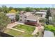 The home features a fenced backyard with a deck and garden, offering ample space for outdoor enjoyment at 1973 Bahama St, Aurora, CO 80011