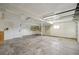 Spacious unfinished basement with exposed ceiling, concrete floor, and white walls at 1973 Bahama St, Aurora, CO 80011