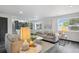Inviting living room with a comfortable seating area and views to the outside at 1973 Bahama St, Aurora, CO 80011