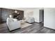 An inviting living area featuring a striking fireplace, comfortable furniture, and modern accents for a cozy feel at 1973 Bahama St, Aurora, CO 80011