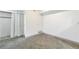 Bright and airy bedroom featuring neutral paint, ample closet space, and soft carpeting at 14454 E Colorado Dr # 103, Aurora, CO 80012