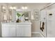 Clean bathroom, double vanity and walk in shower at 847 Ledge St, Lochbuie, CO 80603