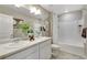 Bathroom with double sinks, tub and shower at 847 Ledge St, Lochbuie, CO 80603