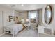 Charming bedroom with a canopy bed and whimsical decor at 847 Ledge St, Lochbuie, CO 80603