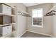 Spacious walk-in closet with built-in shelving at 847 Ledge St, Lochbuie, CO 80603