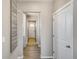 Bright entryway with wood-look floors and neutral walls at 847 Ledge St, Lochbuie, CO 80603