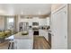 Modern kitchen with stainless steel appliances and granite countertop at 847 Ledge St, Lochbuie, CO 80603