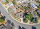 Aerial view of home showcasing mature trees, surrounding neighborhood at 6640 S Heritage W Pl, Centennial, CO 80111