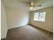 Bedroom with a ceiling fan and a large window allowing for plenty of natural light at 6640 S Heritage W Pl, Centennial, CO 80111