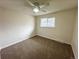 Cozy bedroom featuring neutral tones, a ceiling fan, and a bright window at 6640 S Heritage W Pl, Centennial, CO 80111